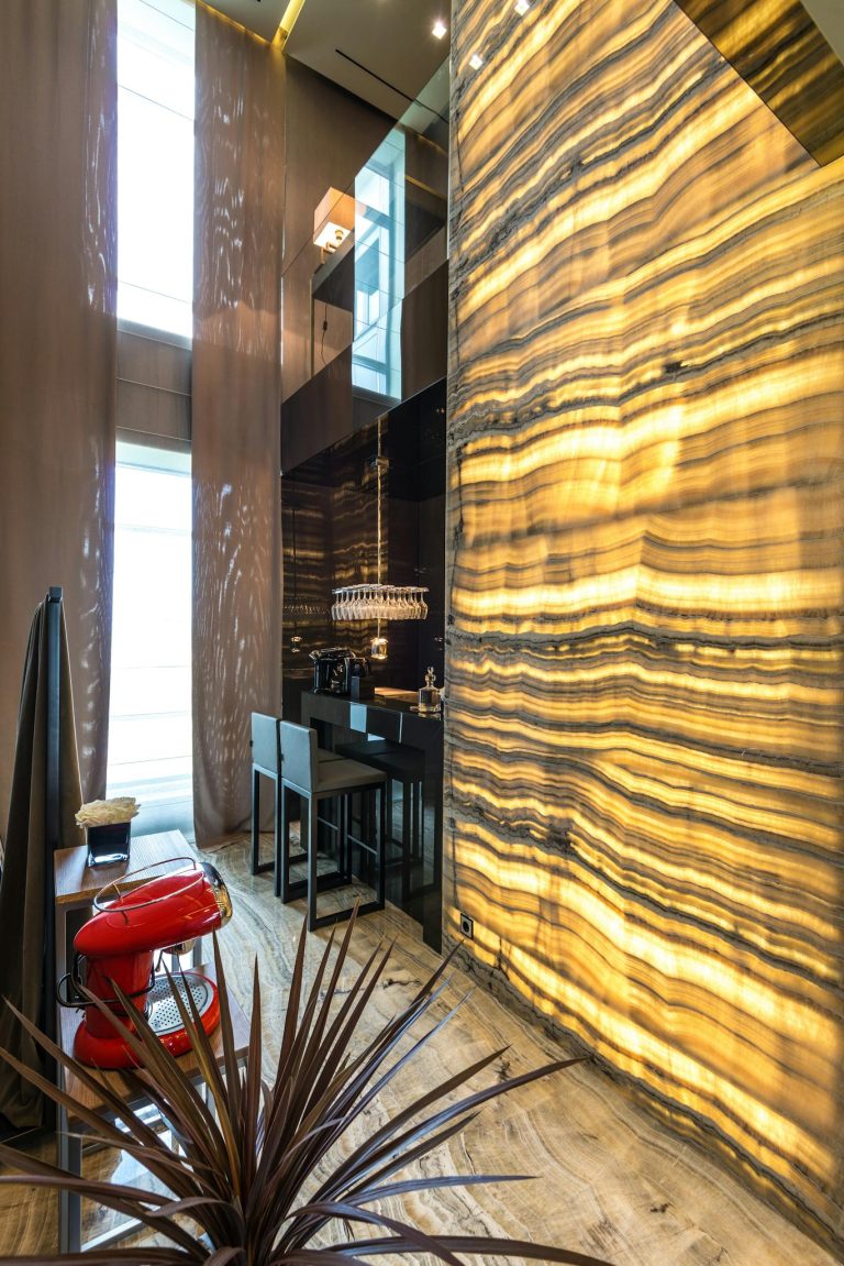 Luxurious modern home interior with unique lighting and contemporary furniture.